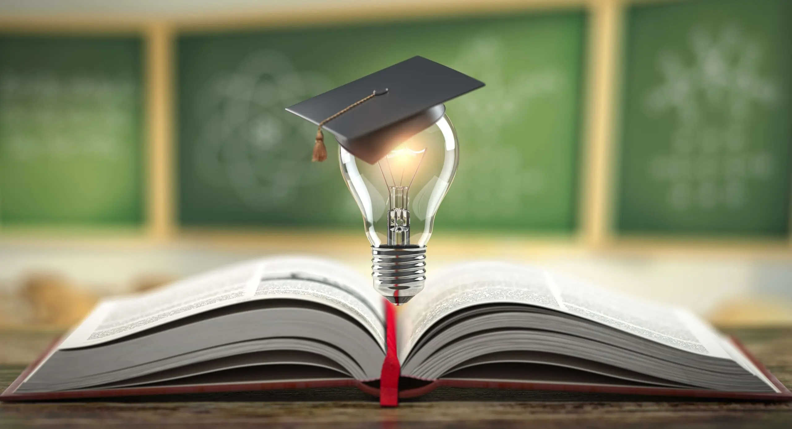 Lightbulb with graduation cap